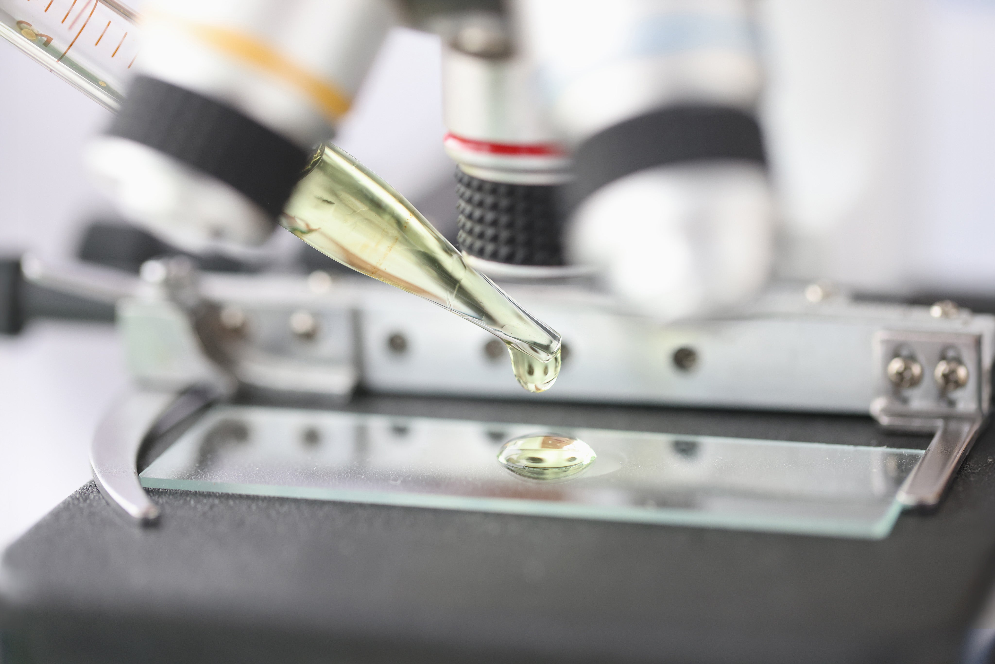 Laboratory testing of supplements health formula under microscope