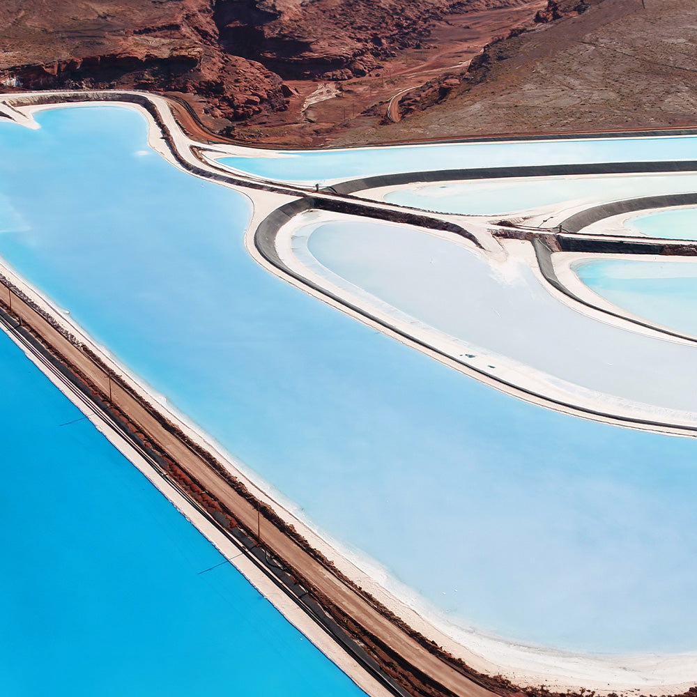 supplements health, aerial view of blue water pools with surrounding brown terrain