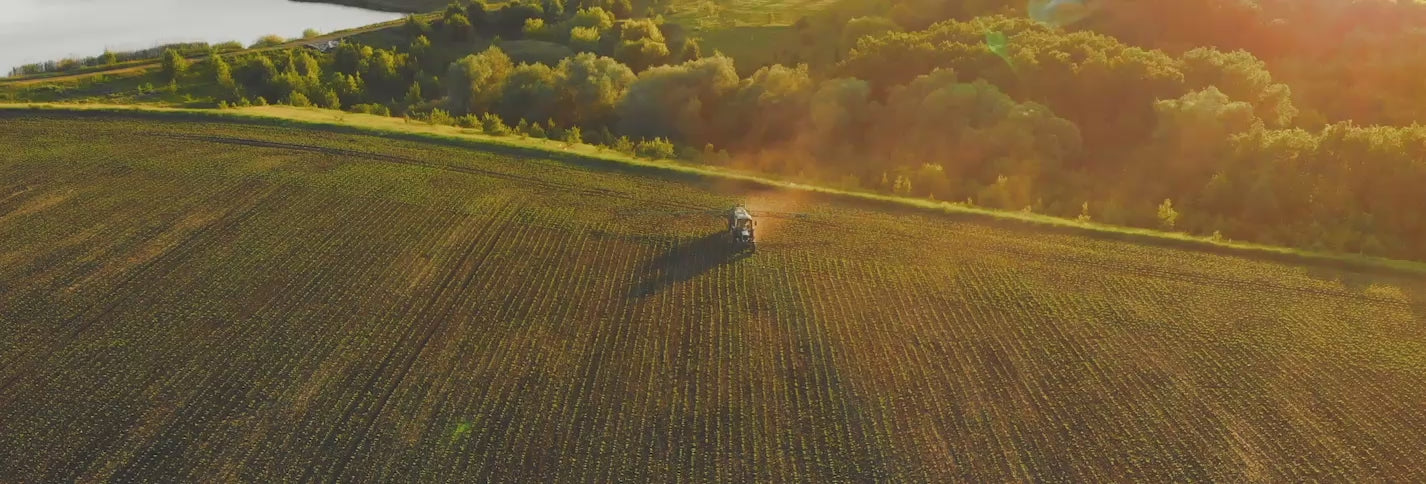 tractor spraying a field