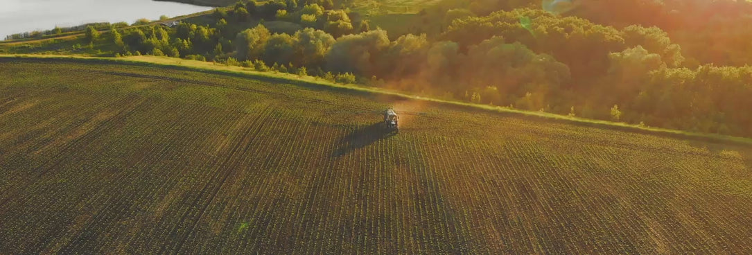 tractor spraying a field